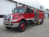 HME Ahrens Fox International 4400 | 4dr w/ stainless body and subframe, 38000 gvw, 330hp, 1250 pump, 1200 gal. poly tank, LED warning lights, plumbed for deck gun, roll up crosslays, striped